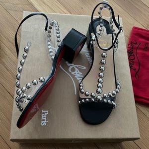 Christian Louboutin never worn sandals size 38. Given as gift not my style.